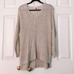 Cute, breathable, and soft tan sweater.